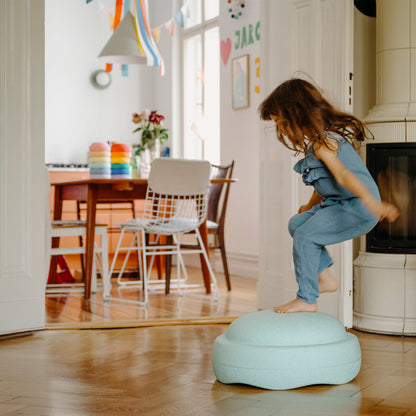 Little Girl Balancing On The Stapelstein Grow Stone - Mint