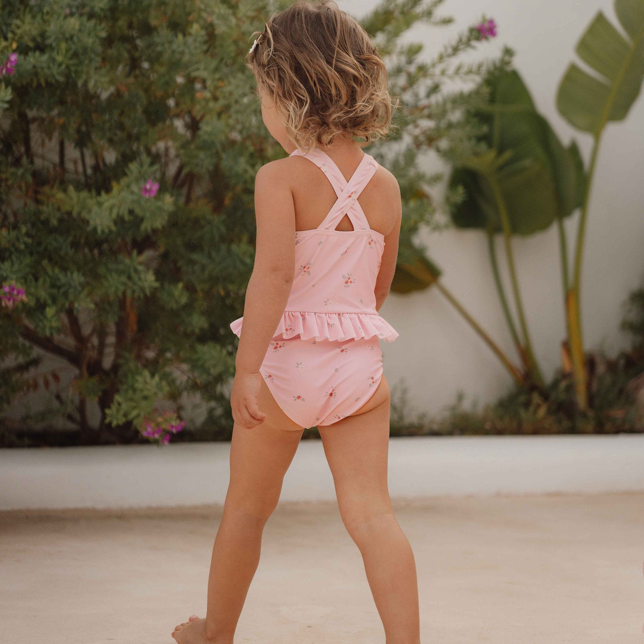 Little girl in swimming suit on sale