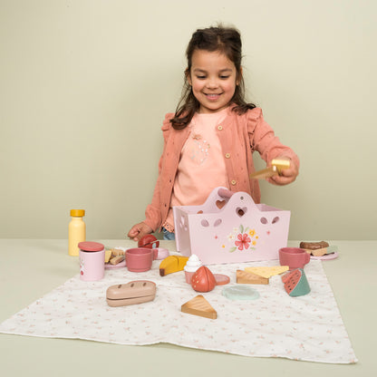 Little Girl Playing With Little Dutch Picnic Set