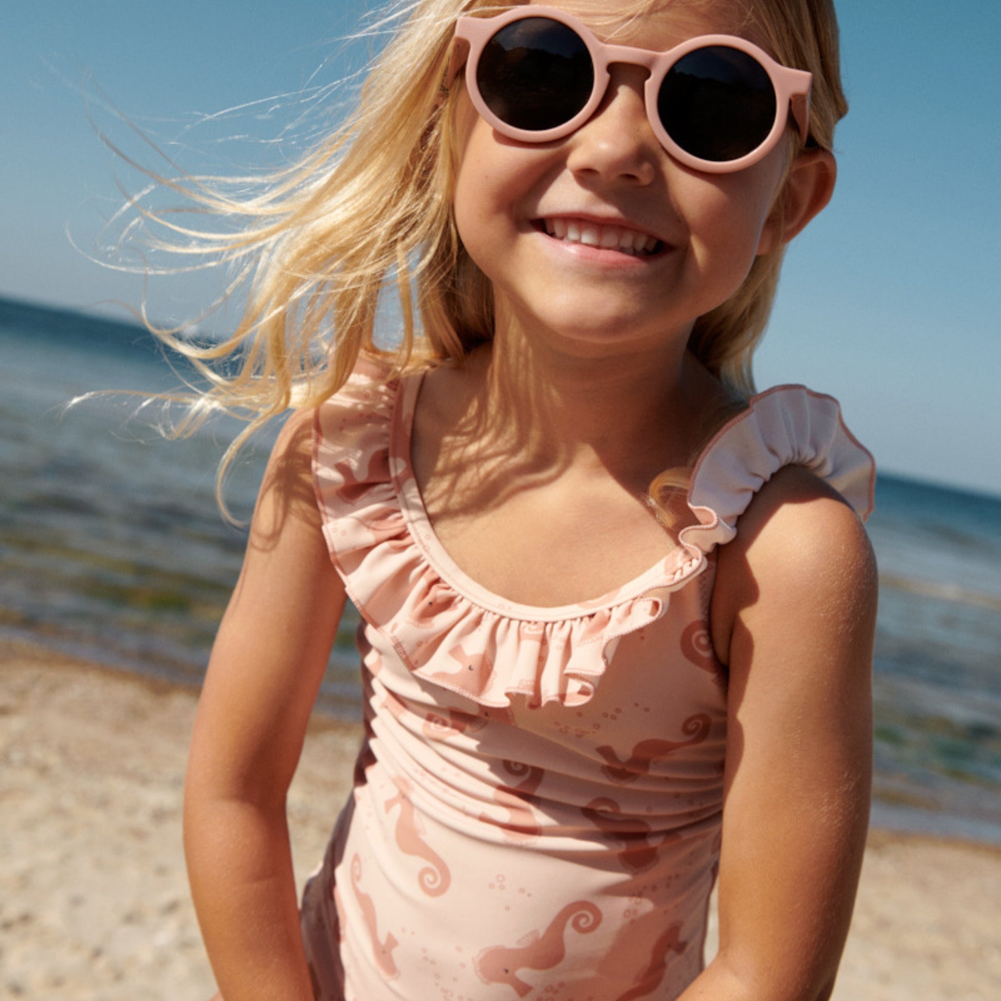 Liewood Kallie Printed Swimsuit - Seahorse / Apple blossom - Close Up 