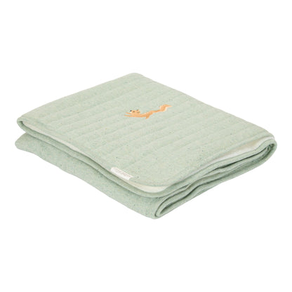 Green blanket with embroidered fox, folded