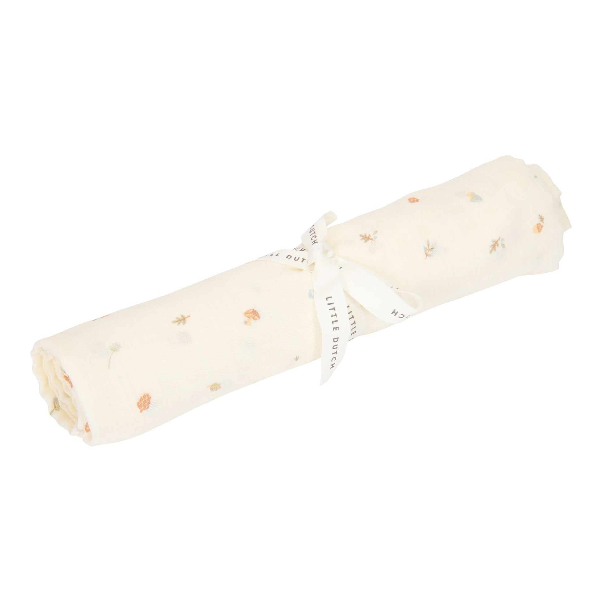 Muslin swaddle tied with a ribbon, decorated with mushrooms, acorns and other forest elements