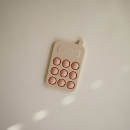 Mushie Phone Press Toy - Blush