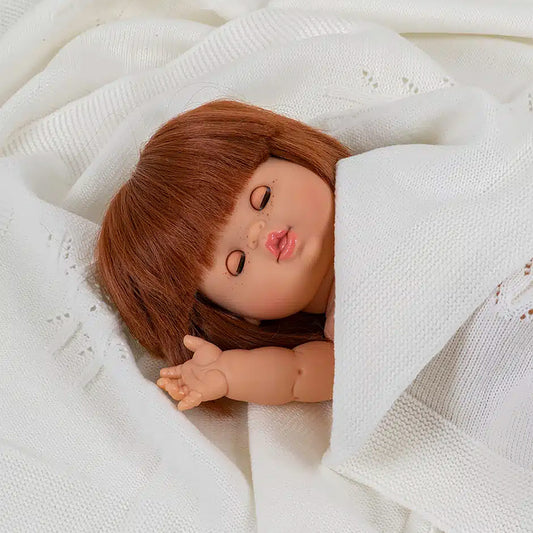 Minikane Girl Doll 34cm - Nasturtium With Sleepy Eyes laying down with her eyes closed 