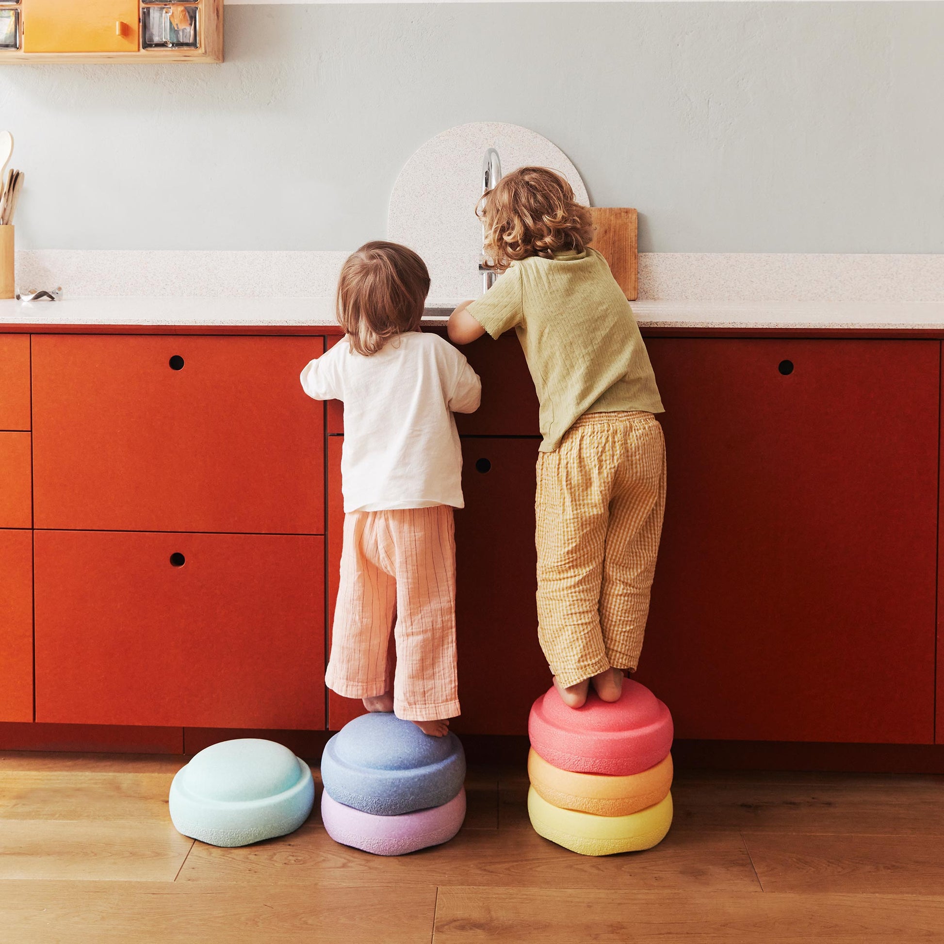 Stapelstein Stepping Stones - Kids using as stepping stones in the kitchen