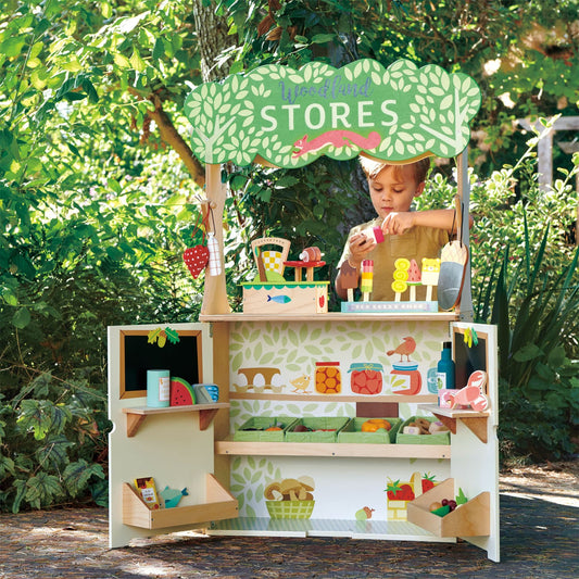 child playing with toy shop