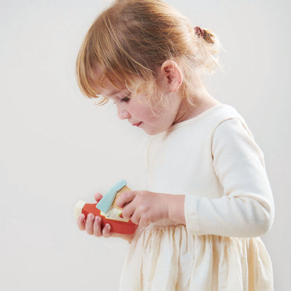 child playing with till