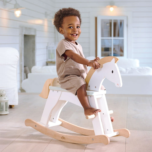 child on a rocking horse