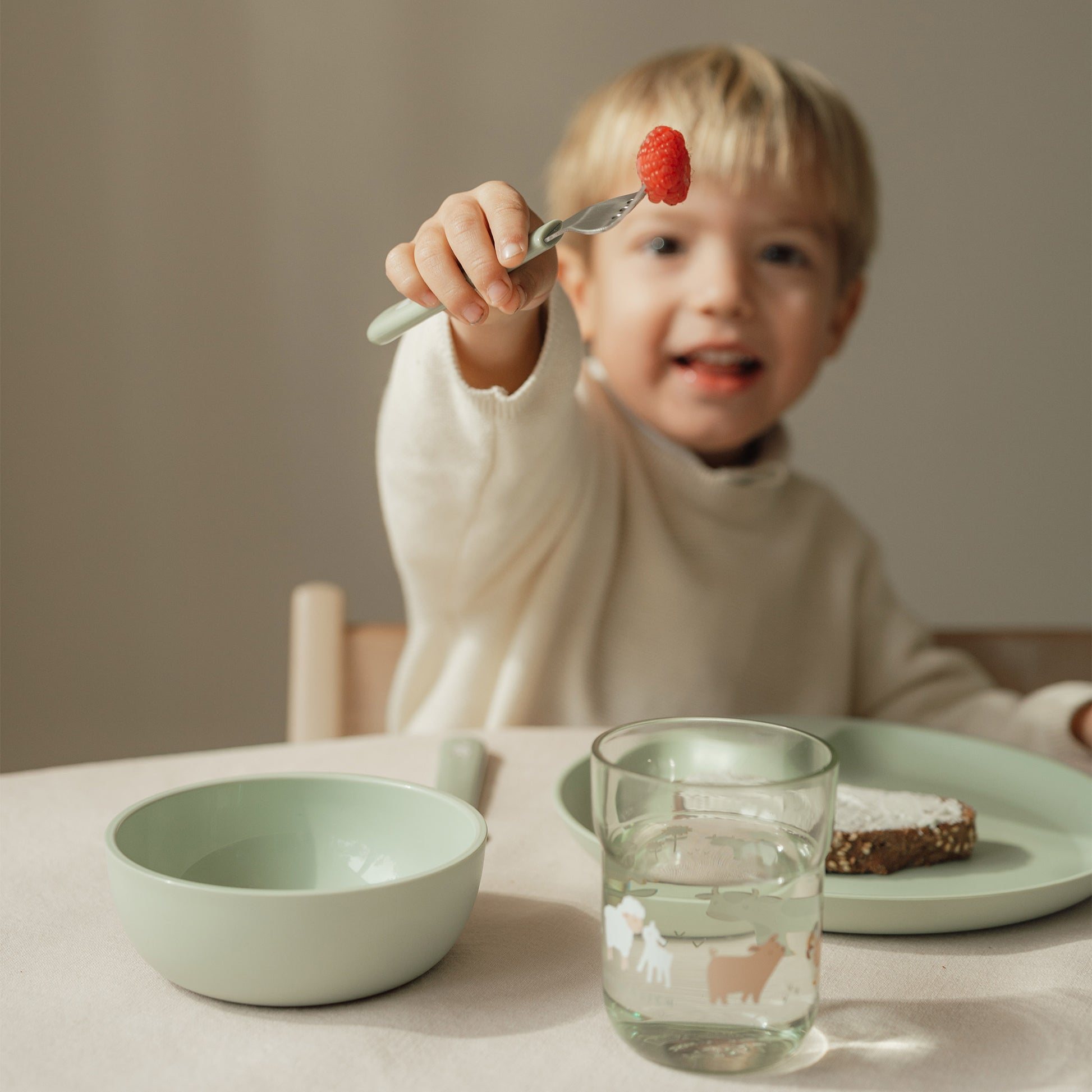 Little Boy Eating Breakfast With The Little Dutch Baby Dinnerware Set 6 pcs - Little Farm - 