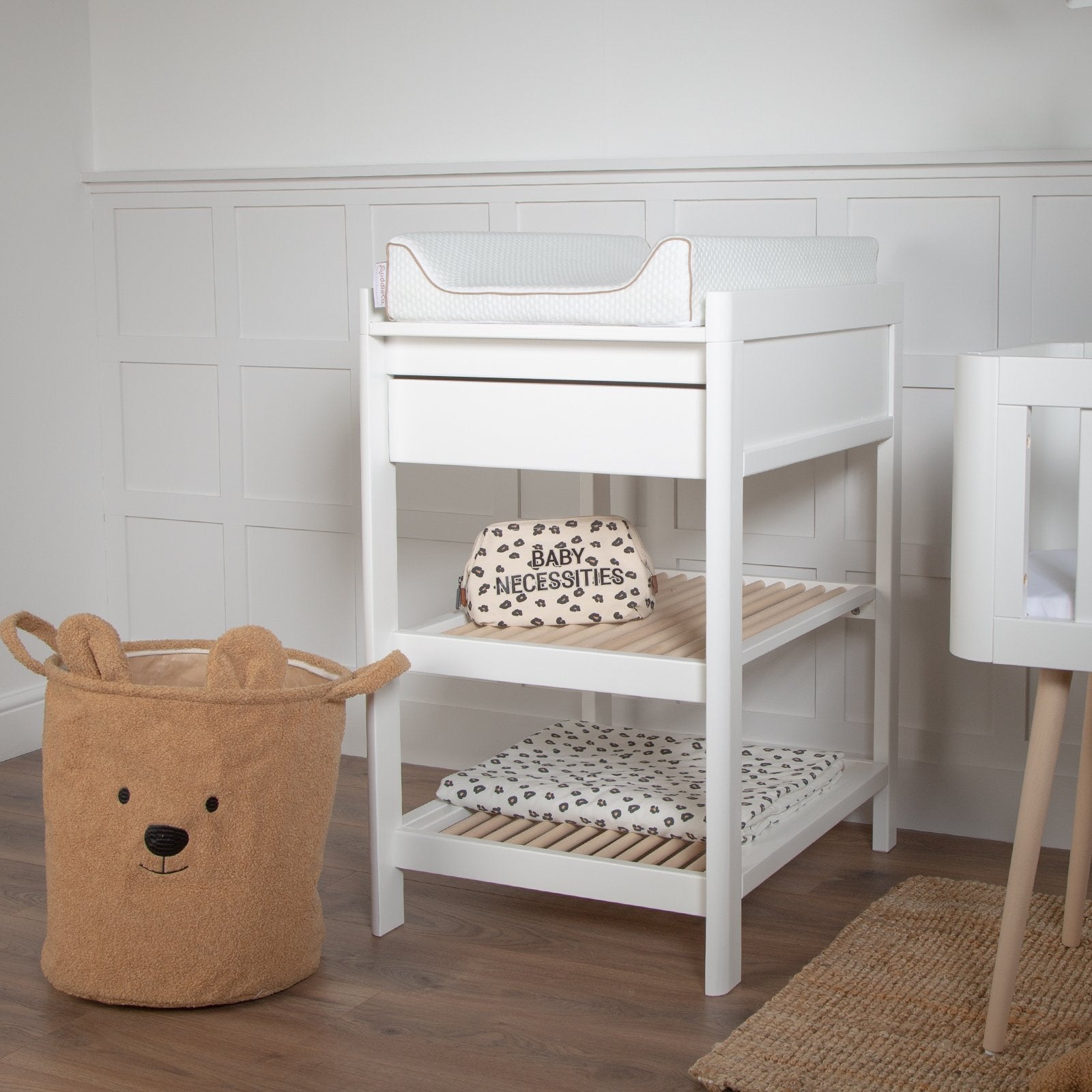 White wood store changing table